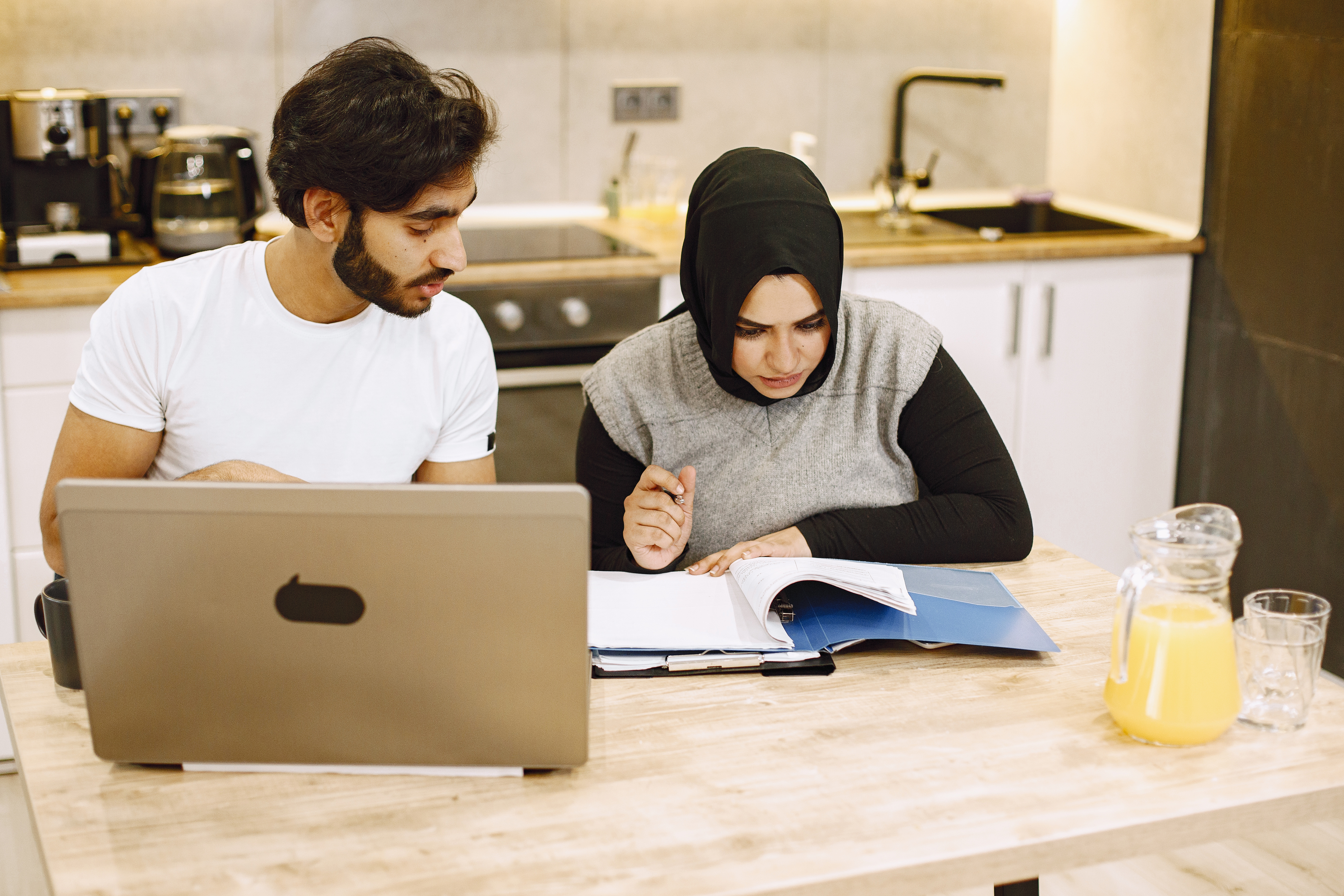 Couple discussing their agreement at home